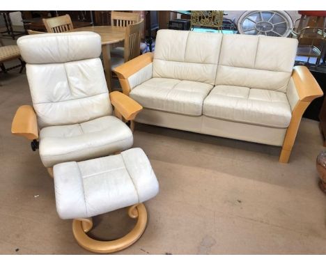 Light wood framed two seater sofa with matching reclining armchair and footstool, sofa approx 157cm wide