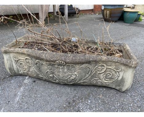 Concrete garden planter with cherubs