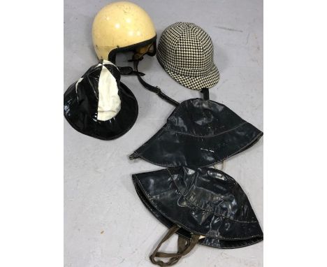 Collection of vintage helmets and hats to include houndstooth riding hat, motorcycle helmet etc