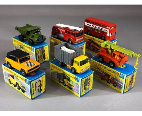 Six boxed Matchbox Superfast diecast model vehicles: 18 Field Car, 28 Mack Dump Truck, 35 Merry Weather Fire Engine, 37 Cattl