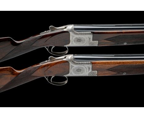 FABRIQUE NATIONALE A PAIR OF 12-BORE 'B1' SINGLE-TRIGGER OVER AND UNDER EJECTORS, serial no. 33718 S71 / 33719 S71, for 1971,