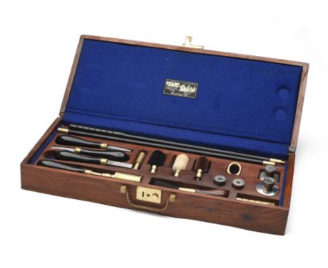 A PRESENTATION 12-BORE DELUXE GUN ACCESSORY AND CLEANING KIT, fitted partitioned tray lined with green baize, with separate c