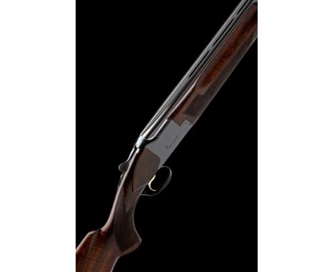 FABRIQUE NATIONALE A 12-BORE 'JOHN MOSES SPECIAL TRAP' SINGLE-TRIGGER OVER AND UNDER EJECTOR, serial no. 893RN1242, dated 197