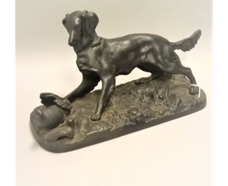 A Russian patinated cast iron figure of a dog with quarry, bearing label and inscribed to base "KACNH 1978", together with fr