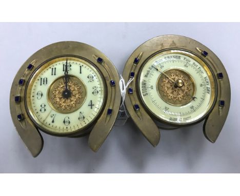 A desktop clock/barometer in the form of two horseshoes, the barometer inscribed "Made in Paris"