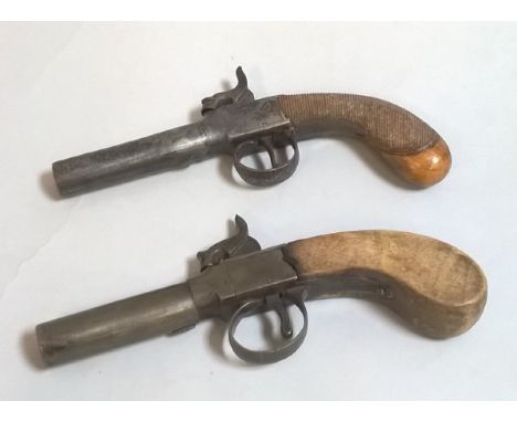 A 19th Century hammer action pocket pistol with hatched grip and foliate engraved side plates together with another 19th Cent