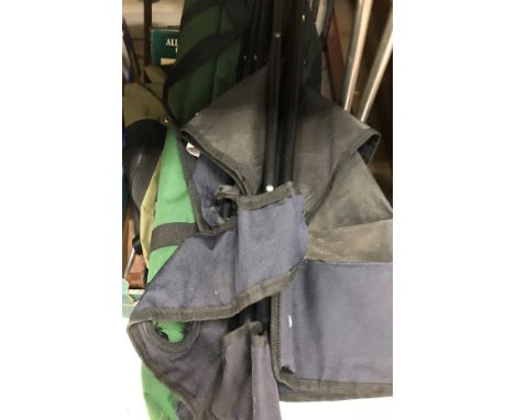 A collection of various requisites to include game bag, game carriers, other canvas bags, waistcoat, game bird shooting stick