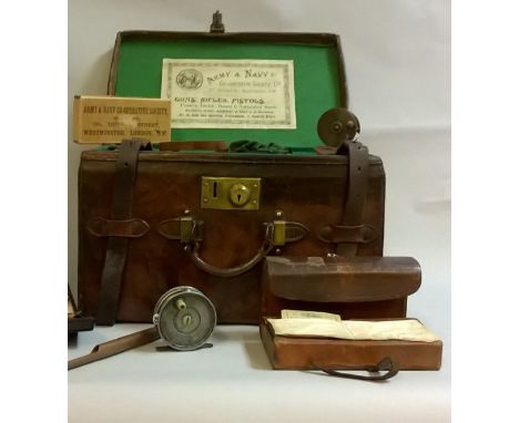 An Army & Navy leather fishing tackle compendium containing compartments and a lift out tray.  The case contains an Army & Na