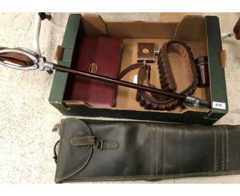 A Parker-Hale gun cleaning kit, cartridge belt, gun sleeve, shooting stick, hip flask and beakers