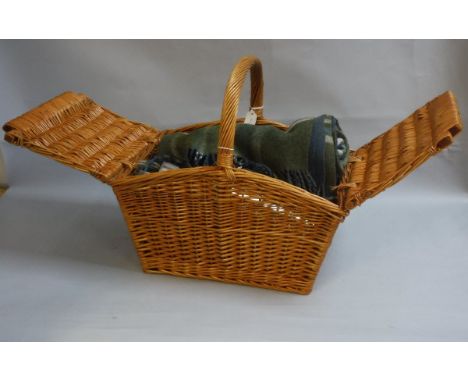 A modern cane picnic basket, two rugs and a Stanley flask