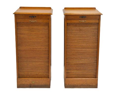 Pair of oak tambour front filing cabinets, labelled M.O.S. HMT/F5, width 49cm, depth 41cm, height 103cm, both with keys.  Con