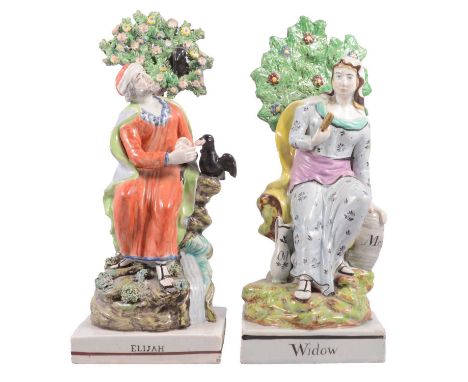Matched pair of Staffordshire earthenware bocage figures, Widow of Zarephath and Elijah and the Ravens, circa 1800, the widow