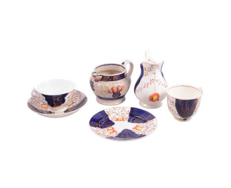 A 'Gourdy Welsh' part teaset, comprising cake plates, plates, teacups, saucers, milk jug and cream jug.Qty: 1 box
