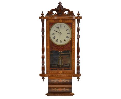 American walnut and parquetry wall clock, width 40cm height 95cm.