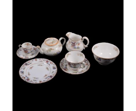 A Royal Worcester Chinese Jardiniere pattern part breakfast service, to include cake plate, lidded muffin dish, plates, small
