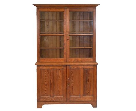 Victorian pitch-pine cabinet, labelled Kingfisher Ltd., West Bromwich, glazed panelled doors to the upper section enclosing t