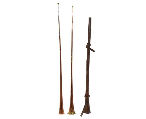Copper and brass coaching horn, 127cm, with mouthpiece and leather case; another coaching horn and a post horn.Qty: 3