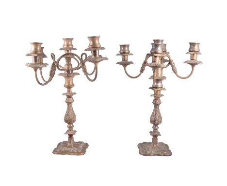 Set of three electroplated five-light candelabra, each with four reeded branches, cast columns, shaped square bases, height 4