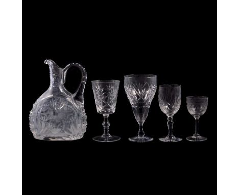 Collection of table crystal and other glassware including a  cutglass decanter with silver collar, other decanters; tumblers;