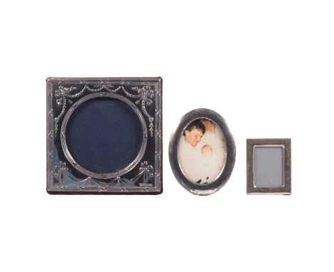 A silver-mounted photograph frame, Keyford Frames Ltd, London 1990, square form with 9.25cm circular aperture, swag design, r