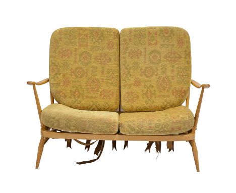 Ercol beech two seat sofa, hoop and spindle back, loose cushions, width 134cm, height 91cm.