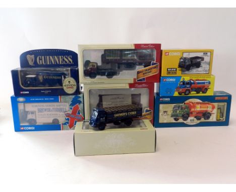 Eight boxed Corgi vehicles in 1:50 scale to include seven axle models in various liveries with CC13306 BMC Flatbed