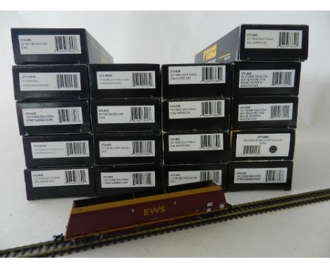 Eighteen boxed Graham Farish freight wagons in EWS livery to include cat no 373 open wagons, coal hoppers, open wagons, steel
