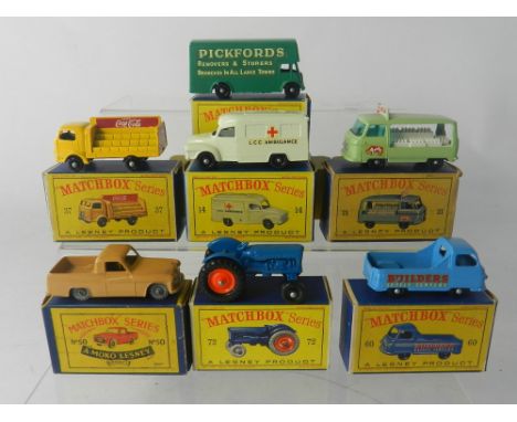 Seven boxed Matchbox Series vehicles No 46b Pickfords Removals Van, No 37 Coca-Cola Truck (BPW), No 14c Lomas Ambulance, No 2