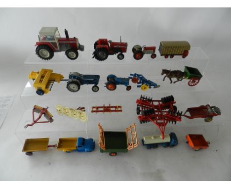 A mixed collection of twenty playworn farm related toys by Britains, Budgie, Corgi, Dinky, etc including tractors, implements