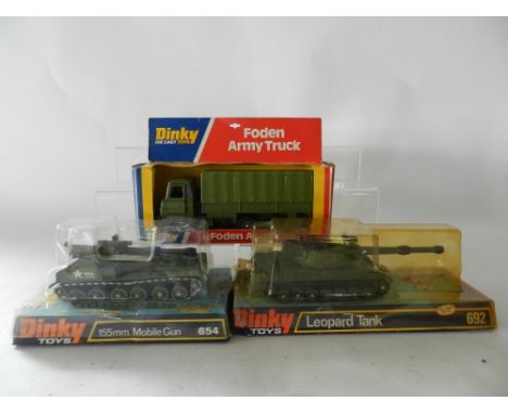 A collection of three Dinky toys- military vehicles circa 1970's manufacture in original packaging being No 654 155mm mobile 