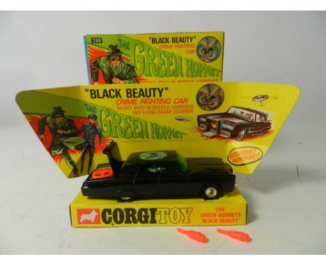 A boxed Corgi Toys No 268 Green Hornet 'Black beauty', the model with one radar scanner and two missiles, lacks secret instru