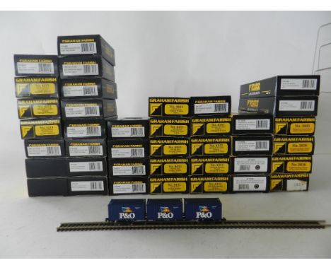 Thirty seven boxed Graham Farish freight wagons to include four 'Axis' container wagons, 15 powder wagons, four mineral wagon