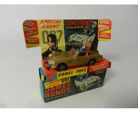 A boxed Corgi Toys No 261 James Bond Aston Martin in original box and display plinth, lacks secret instructions envelope and 