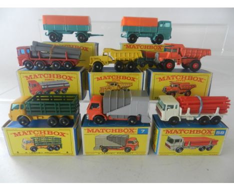 Eight boxed Matchbox 1-75 1-75 series commercial vehicles to include No 4 Stake Truck, No 7 Refuse Truck, 28 Dump Truck, 6 Eu