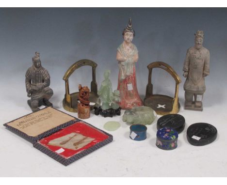 A pair of Chinese brass stirrups, a carved soapstone dragon chop, a Chinese fish fossil, various oriental items and three pot