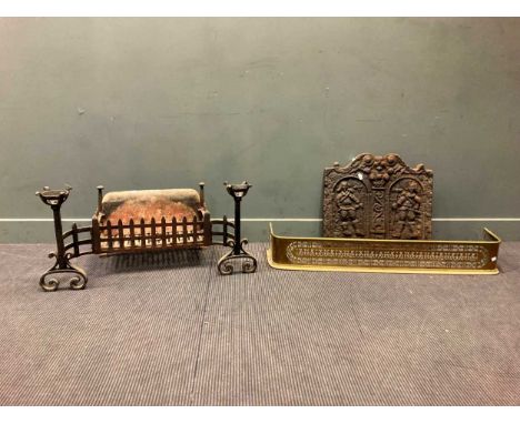 A cast iron fire back with pair of inset standing figures 56 x 61cm, a dog grate with fixed andirons 100cm wide and a pierced