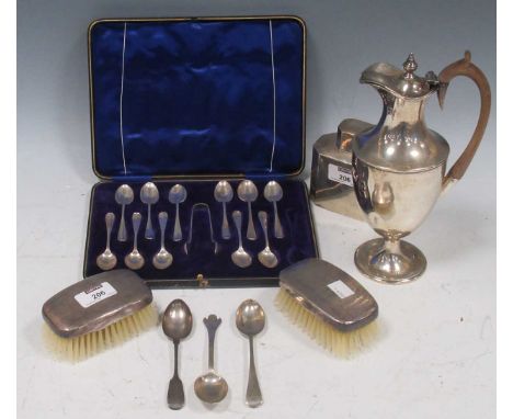 A collection of silver including cased flatware, a tea caddy, wine ewer hair brushes etc, 23.8ozt weighable silver