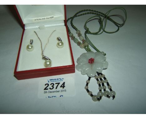 A silver and pearl Necklace and Ear-ring set, and a white Jade Necklace
