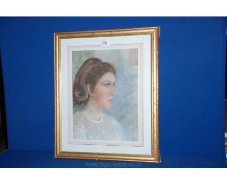A framed and mounted Charcoal picture of a Portrait of a young lady, initialled lower right, F.G.G, 16'' x 19 1/2''.