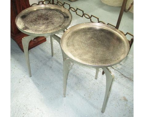 SIDE TABLES, a pair, circular in metal on tripod supports, 38cm diam x 55cm H. (2)