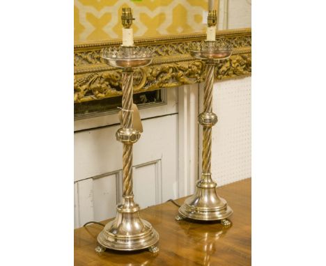CANDLESTICK LAMPS, a pair, early 20th century silvered metal with spiral twist columns and shades, 100cm H. (2)