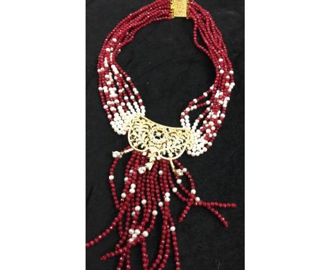 An ornate ruby necklace