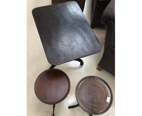 Three mahogany wine tables on tripod bases