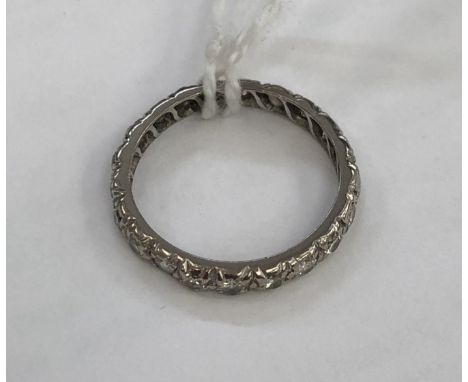 A diamond eternity ring, approx J/K