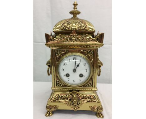 A 19th century French brass and copper cased eight-day mantel clock, striking on bell