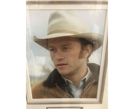 A framed &amp; glazed signed photograph of Heath Ledger with COA