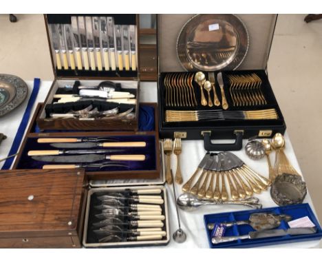 Gold-plated cutlery set in case; together with vintage cased cutlery and wine coaster