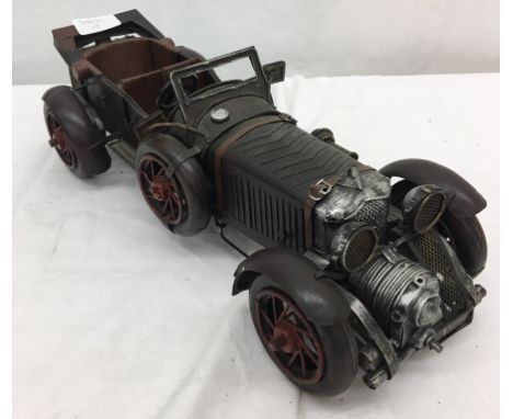 A finely detailed metal vintage car after a 1929 Bentley