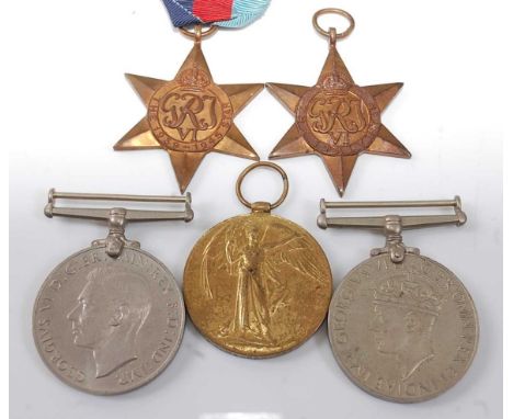 A WW I Victory medal, naming 1697 CPL. E.J. HARPER. 20-LOND. R., together with WW II 1939-1945 Star, Italy Star, Defence and 