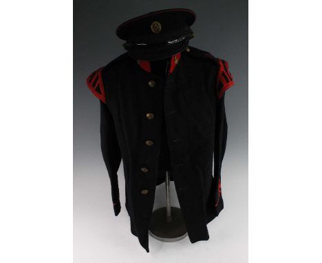 A Church Lads Brigade jacket with matching trousers and peaked cap, together with three CLB regulation booklets, a Sam Browne